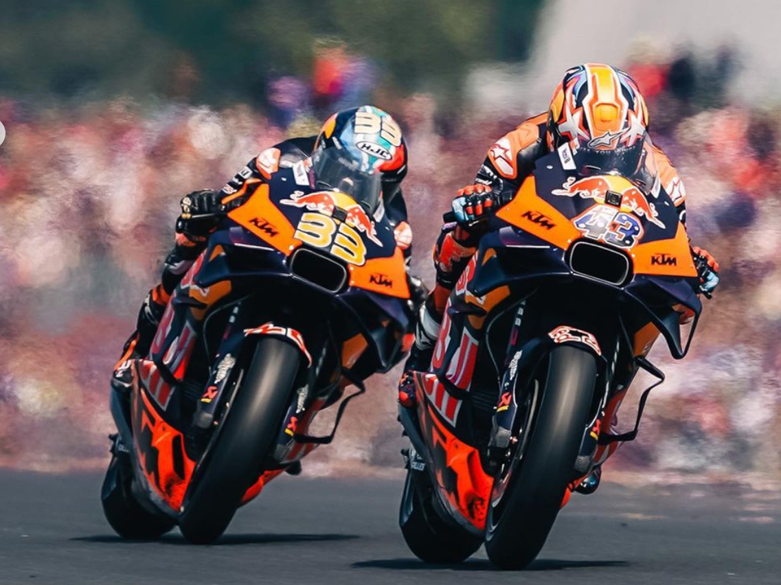KTM riders Jack Miller and Brad Binder go wheel to wheel in front of  sold out crowd.