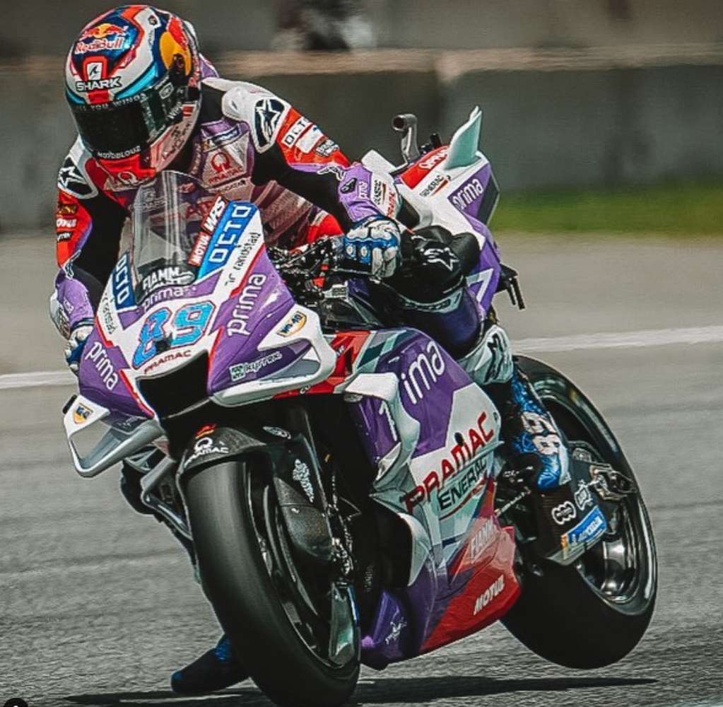 Jorge rides the white, red and purple Pramac, with a blue 89 on the front. His helmet is sponsored by Red Bull, and his leathers are donned with his blue “martinator” nickname on the back.