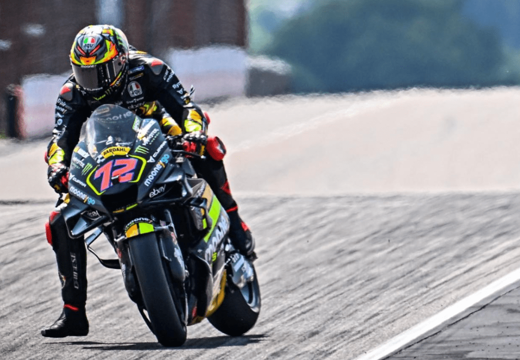Bez can be spotted on the black and neon Mooney VR46 bike, with a red 72 on the front. His helmet is black with a fire motif, and his leathers match the VR46 livery of black and neon yellow.